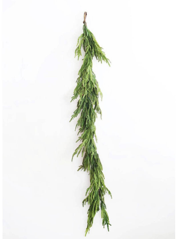 Green garland on a white background