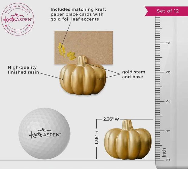 Gold pumpkin decorations with matching paper place cards, labeled features, and a ruler for scale.
