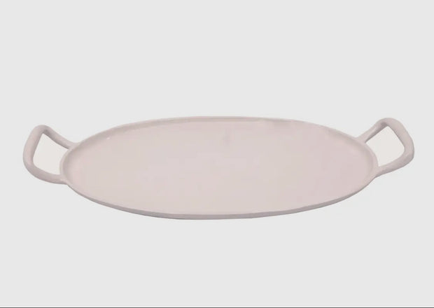 A white ceramic serving tray with handles, displayed against a plain background.
