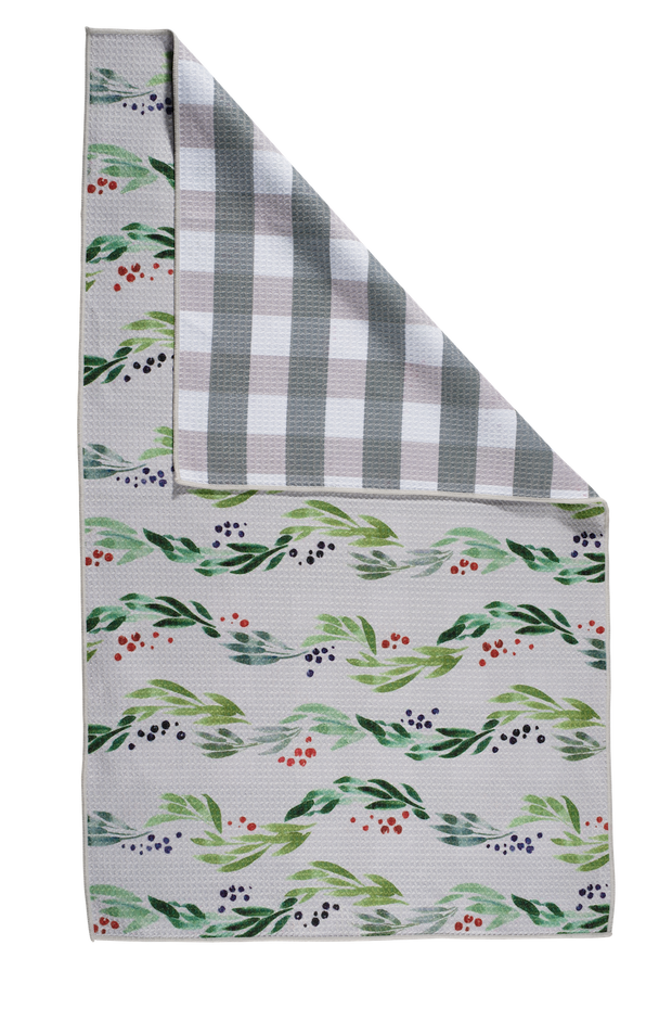 kitchen towel with green leaf pattern on a white background