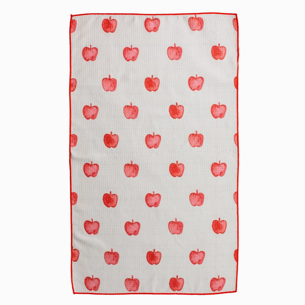 Kitchen towel with red apple pattern on a white background