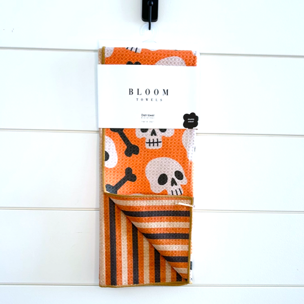 boneyard skeleton kitchen towel hanging on rack