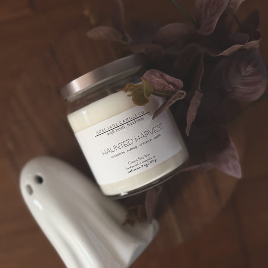 Fall candle featuring warm harvest and eerie fragrance notes