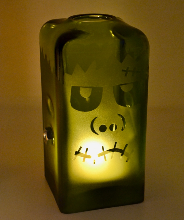 Decorative candle cloche with transparent finish