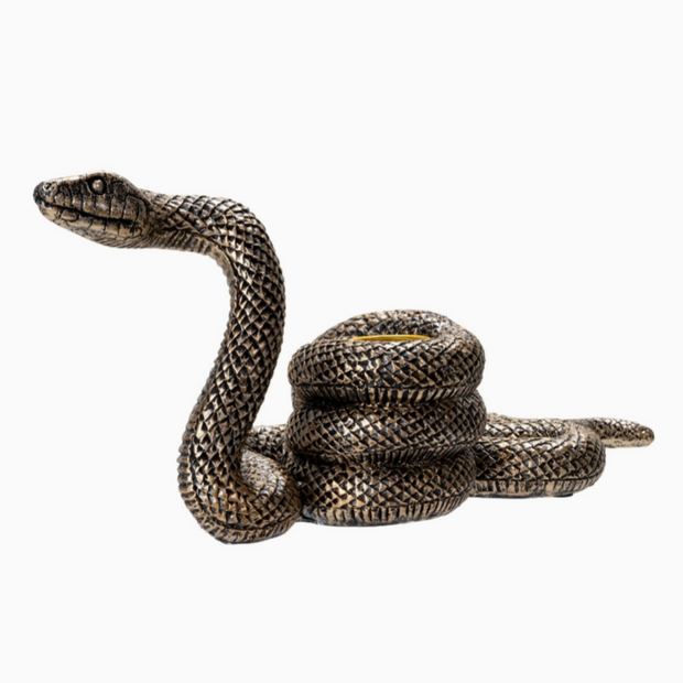 Decorative snake taper holder with vintage-inspired gothic design