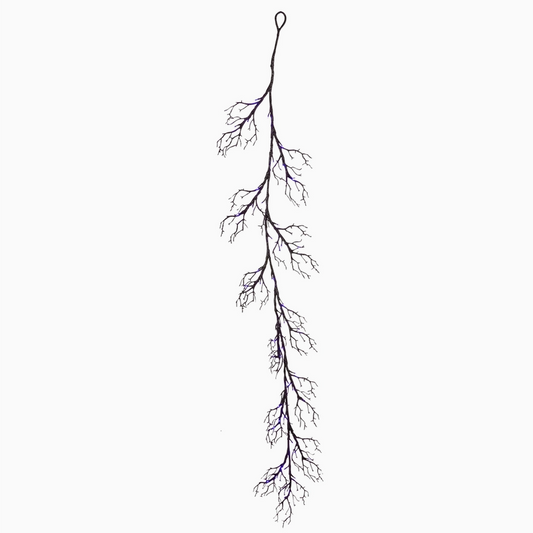 close-up of lighted twig garland glowing warmly