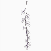 close-up of lighted twig garland glowing warmly