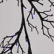 rustic twig garland with LED lights wrapped on shelf