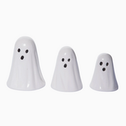 Three white ghost-shaped objects on a white background