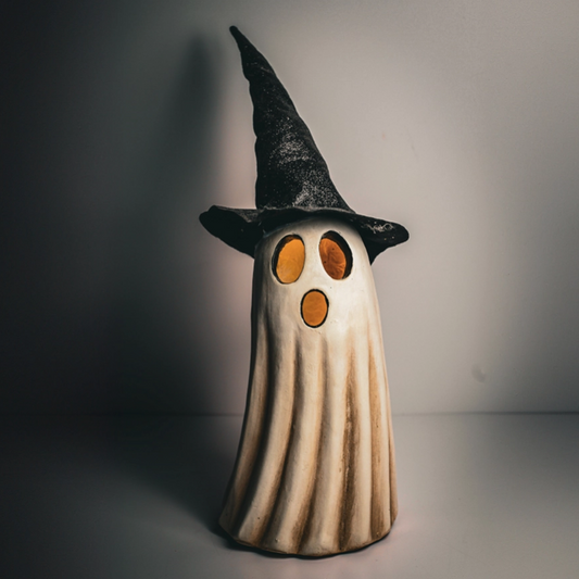 Illuminated ghost print featuring a witch’s hat for Halloween deco