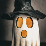 Halloween ghost print with illuminated witch hat design

