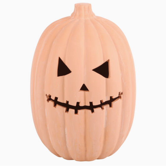 Rustic carved pumpkin terracotta decoration for Halloween
