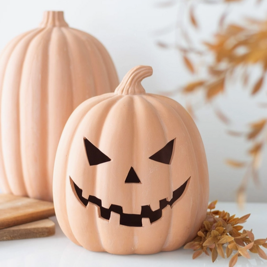 Rustic carved pumpkin terracotta decoration for Halloween