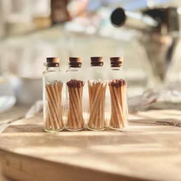 Elegant candle care kit including wick trimmer and matches