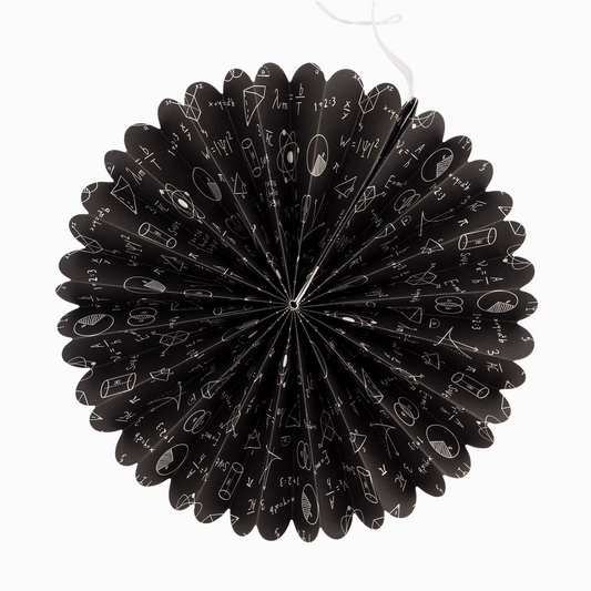 Black paper fan with white designs on a white background