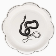 Dark vintage apothecary tableware with eerie bottle motifs