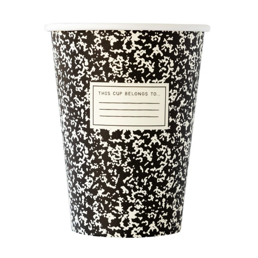 black and white composition notebook cups