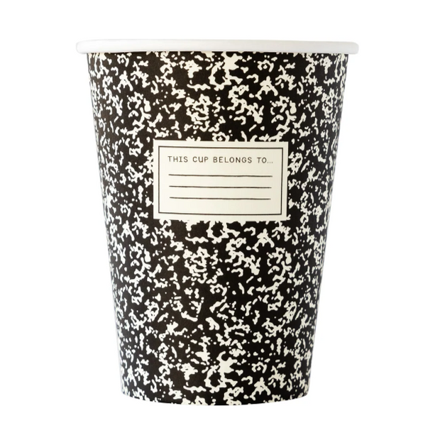 black and white composition notebook cups