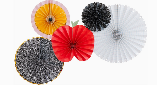 Decorative paper fans in yellow, red, black, and white on a white background