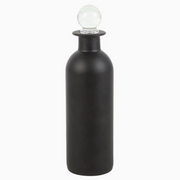 Halloween display bottle with skull and crossbones label