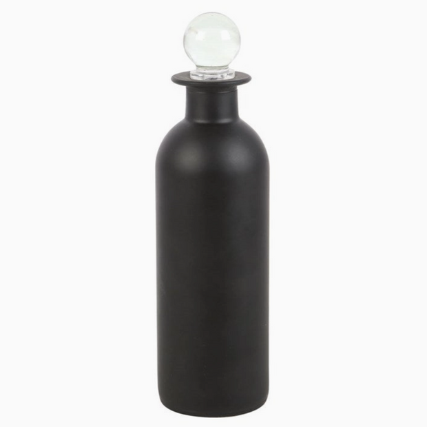 Halloween display bottle with skull and crossbones label