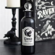 Poison bottle labeled Dried Crow’s Feet for Halloween display