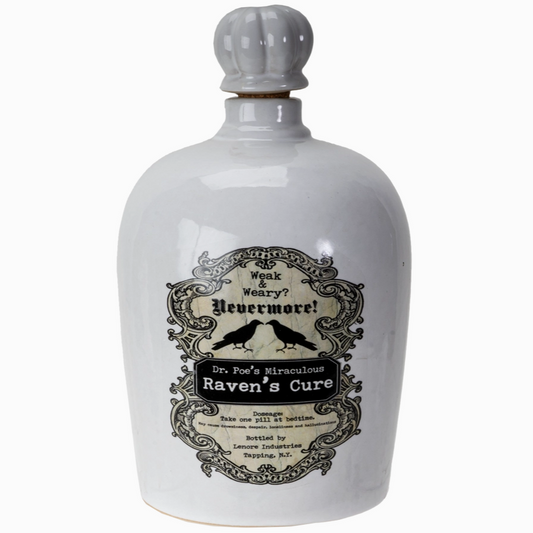 Poison bottle labeled Raven’s Cure with gothic style