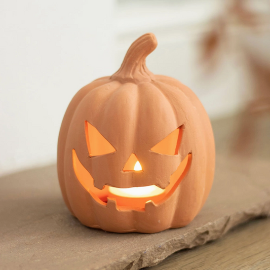 4.9-inch terracotta jack-o'-lantern with carved face