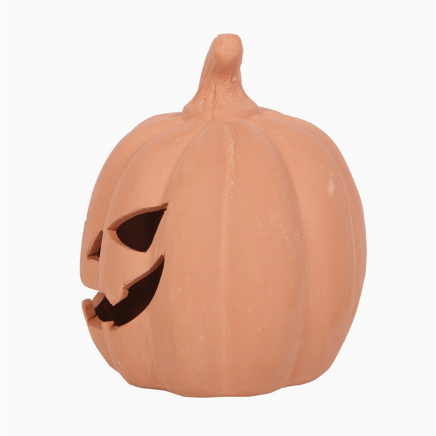 Mini Halloween pumpkin decor in rustic terracotta