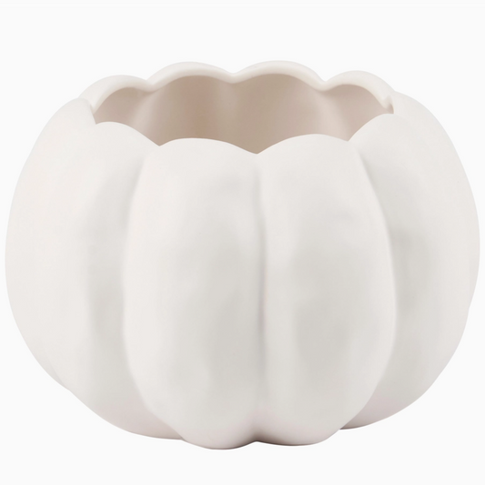 White ceramic pumpkin-shaped vase on a white background