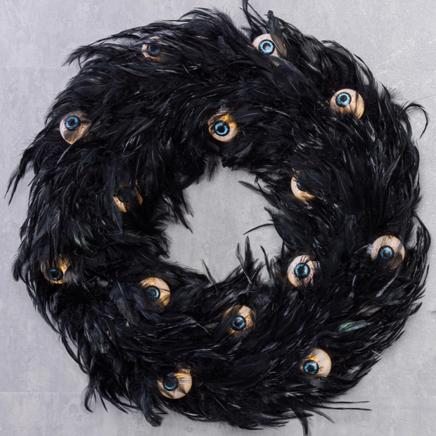haunted house wreath featuring spooky eyes